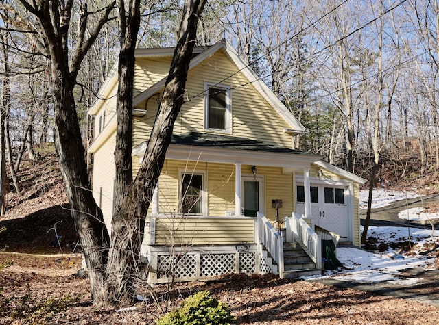 68 Boothby St, Augusta, ME 04330 - view of front of property featuring a porch and a garage