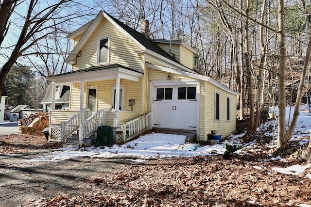 68 Boothby St, Augusta, ME 04330 - view of front facade featuring a porch and a chimney