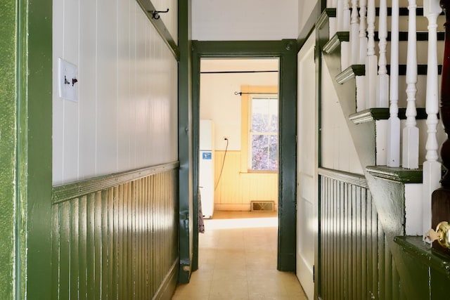 68 Boothby St, Augusta, ME 04330 - hallway with visible vents, wood walls, and wainscoting