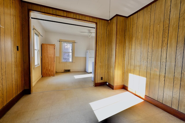 68 Boothby St, Augusta, ME 04330 - empty room featuring tile patterned floors and wooden walls
