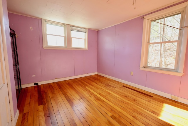 68 Boothby St, Augusta, ME 04330 - unfurnished room featuring baseboards, light wood-type flooring, and ornamental molding