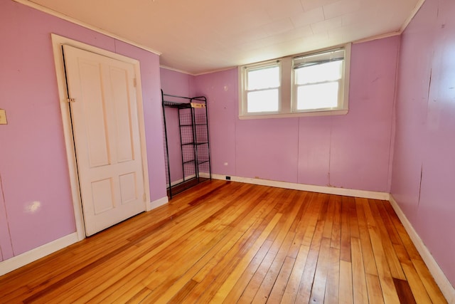 68 Boothby St, Augusta, ME 04330 - unfurnished bedroom featuring baseboards, ornamental molding, and light wood finished floors