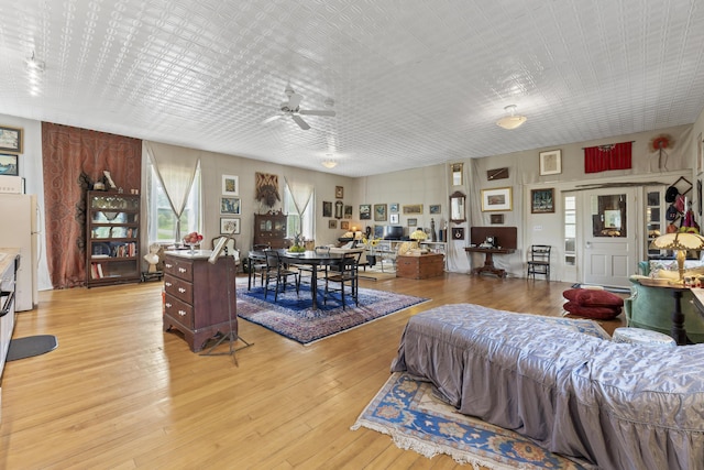 696 Bangor Rd, Troy, ME 04987 - living room with light wood-type flooring and a ceiling fan