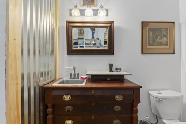 696 Bangor Rd, Troy, ME 04987 - bathroom with vanity and toilet