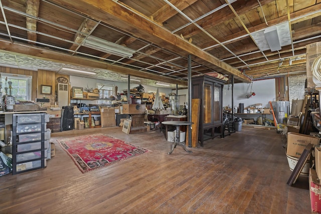 696 Bangor Rd, Troy, ME 04987 - below grade area with hardwood / wood-style floors and water heater