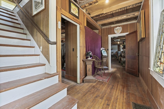 696 Bangor Rd, Troy, ME 04987 - interior space with visible vents, wood walls, stairs, and hardwood / wood-style flooring