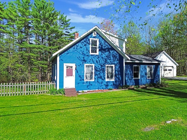 16 Libby Hill Rd, Gardiner, ME 04345 - view of front facade with entry steps, a chimney, and a garage