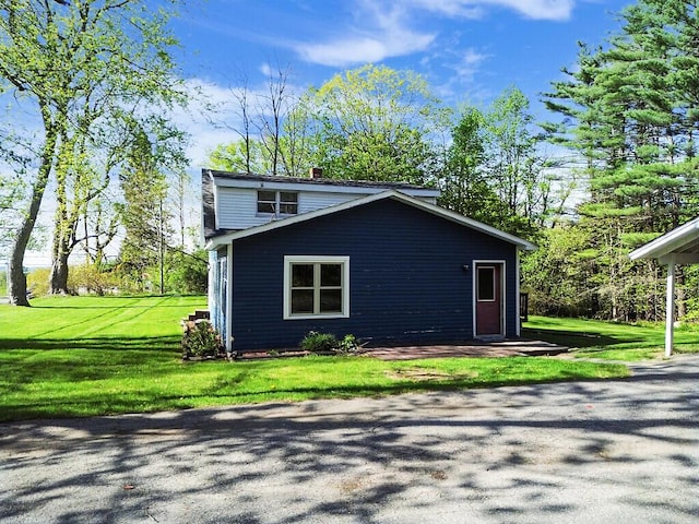16 Libby Hill Rd, Gardiner, ME 04345 - view of side of property with a chimney and a lawn