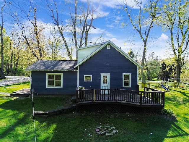 16 Libby Hill Rd, Gardiner, ME 04345 - back of property with a deck and a lawn