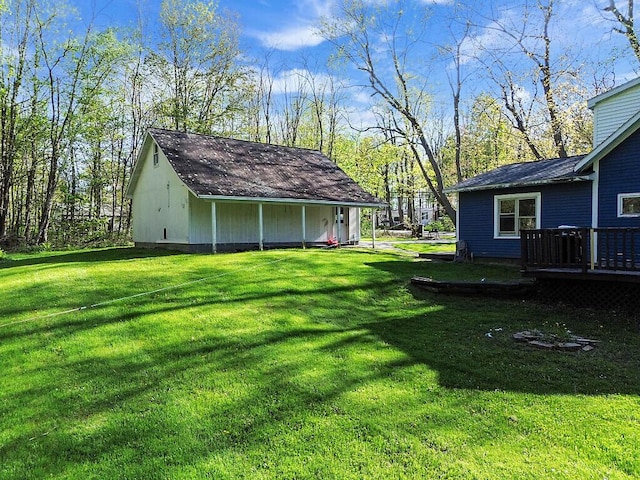 16 Libby Hill Rd, Gardiner, ME 04345 - view of green lawn featuring a wooden deck and an outbuilding