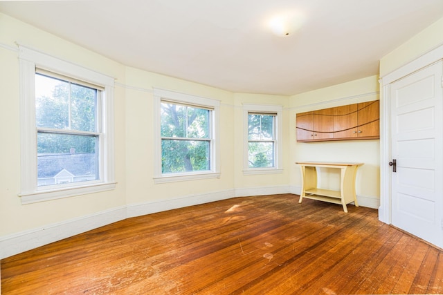 493 Main St, Eliot, ME 03903 - empty room with wood finished floors and baseboards