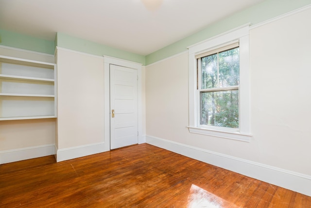 493 Main St, Eliot, ME 03903 - unfurnished bedroom with wood finished floors and baseboards
