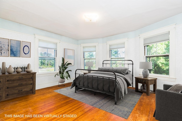 493 Main St, Eliot, ME 03903 - bedroom featuring wood finished floors and multiple windows