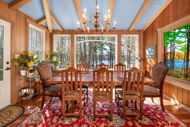 8 Spruce Point Rd, Kittery, ME 03904 - dining space featuring an inviting chandelier, wooden walls, beamed ceiling, and wood finished floors