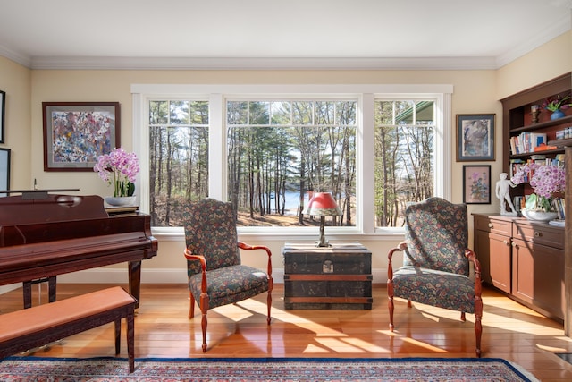 8 Spruce Point Rd, Kittery, ME 03904 - living area with plenty of natural light, crown molding, and light wood-style floors