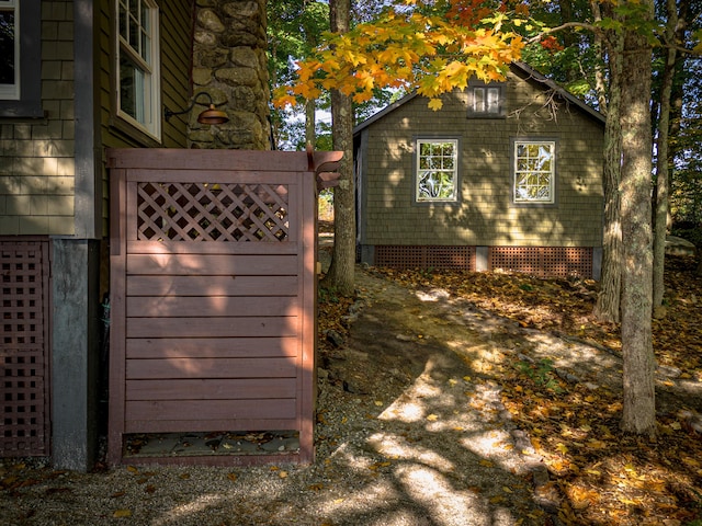view of home's exterior featuring a gate