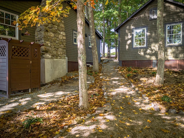 view of property exterior featuring crawl space