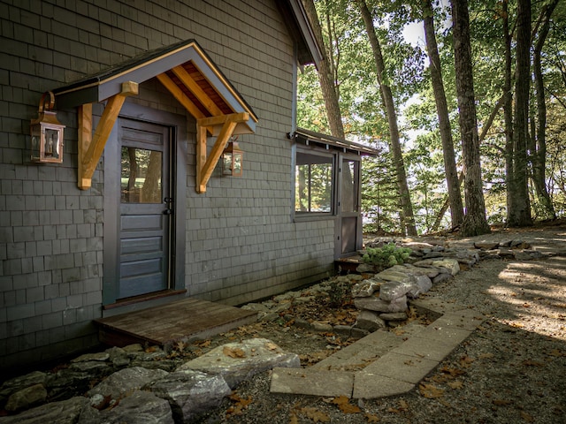 view of property exterior featuring entry steps