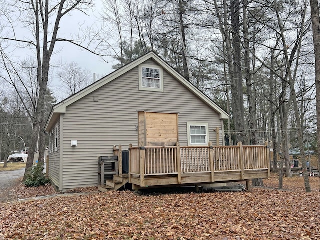 25 Garland Rd, Casco, ME 04015 - back of property with a wooden deck