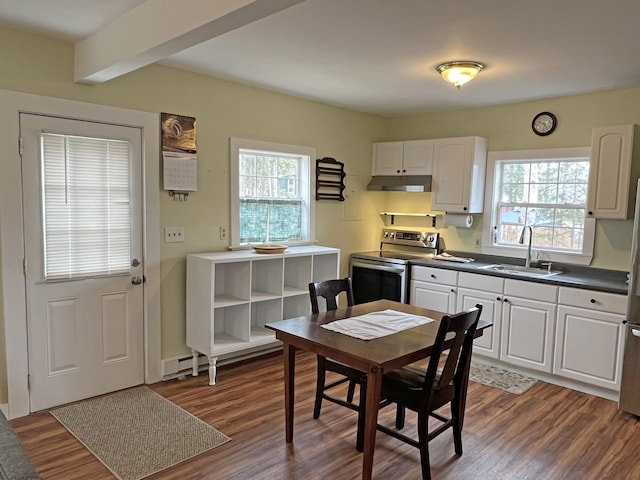 25 Garland Rd, Casco, ME 04015 - kitchen featuring dark wood-type flooring, electric stove, a sink, under cabinet range hood, and dark countertops