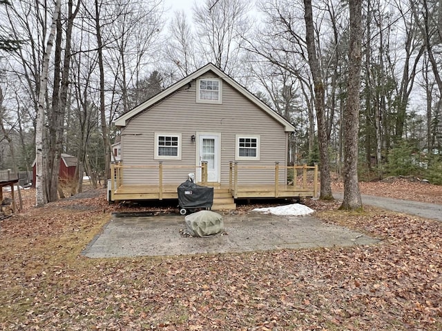 25 Garland Rd, Casco, ME 04015 - exterior space featuring a patio area and a wooden deck