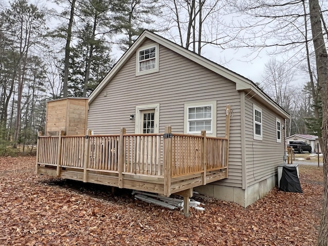 25 Garland Rd, Casco, ME 04015 - rear view of house featuring a wooden deck
