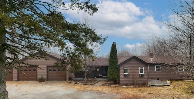 663 Eastbrook Rd, Eastbrook, ME 04634 - view of side of home featuring a garage