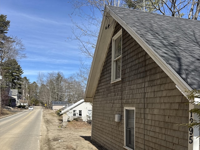 1295 Swan Lake Ave, Swanville, ME 04915 - view of home's exterior with roof with shingles
