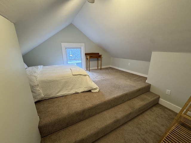 64 Gray St, Portland, ME 04102 - carpeted bedroom featuring lofted ceiling and baseboards