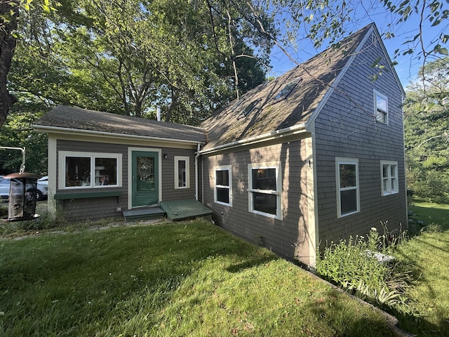 3454 Friendship Rd, Waldoboro, ME 04572 - colonial inspired home featuring a front lawn and roof with shingles