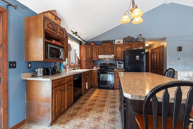 kitchen with black appliances, a sink, under cabinet range hood, a kitchen island, and light countertops
