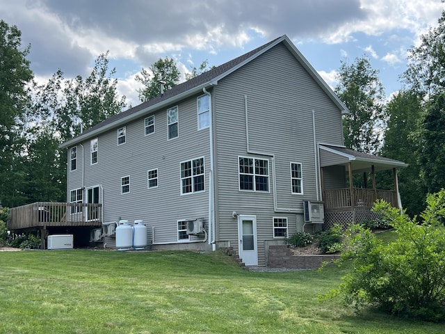 38 Dunston Dr, Glenburn, ME 04401 - back of house with a lawn, cooling unit, and a wooden deck