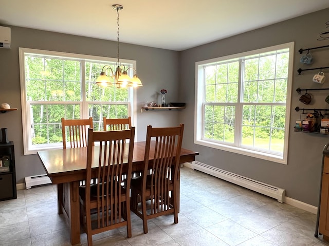 38 Dunston Dr, Glenburn, ME 04401 - dining room featuring a baseboard radiator, a chandelier, a wall unit AC, and light tile patterned flooring