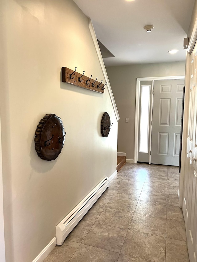38 Dunston Dr, Glenburn, ME 04401 - entrance foyer featuring baseboard heating and baseboards