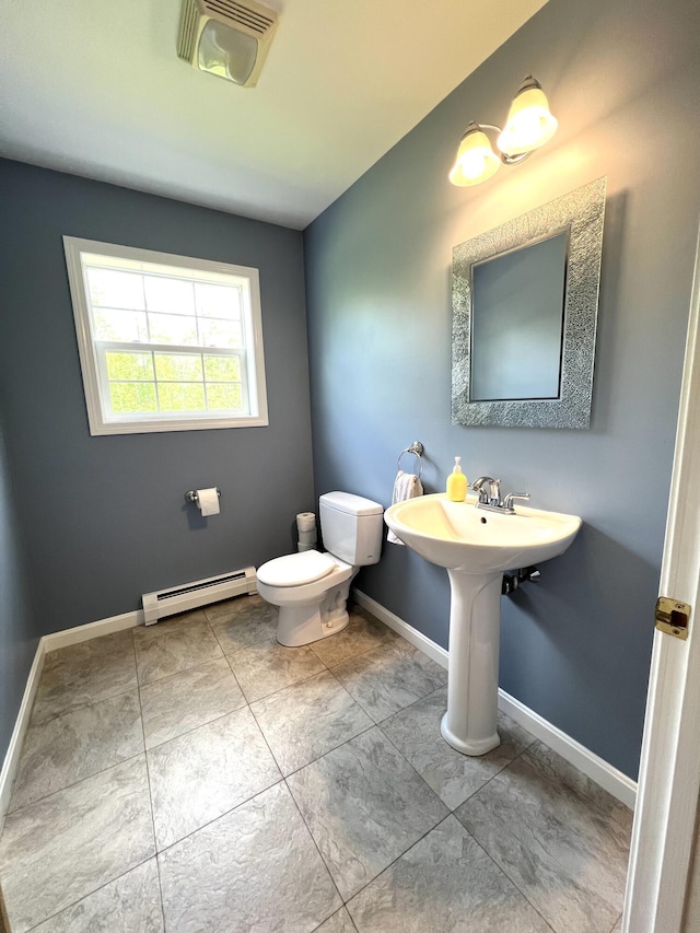 38 Dunston Dr, Glenburn, ME 04401 - half bath featuring a baseboard radiator and toilet