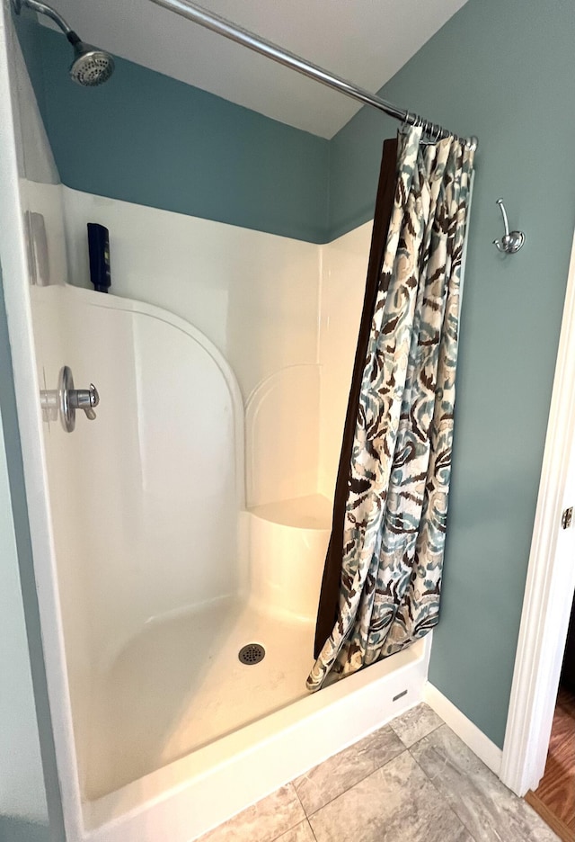 38 Dunston Dr, Glenburn, ME 04401 - full bathroom featuring a shower with curtain and baseboards