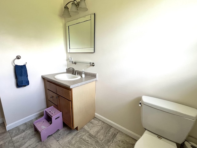38 Dunston Dr, Glenburn, ME 04401 - bathroom with vanity and toilet