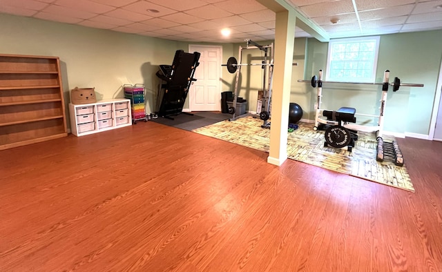 38 Dunston Dr, Glenburn, ME 04401 - workout room featuring a paneled ceiling and wood finished floors