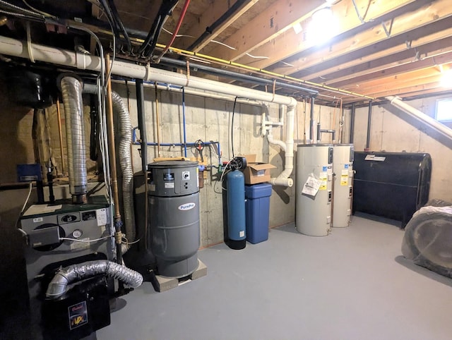 38 Dunston Dr, Glenburn, ME 04401 - unfinished basement with electric water heater, oil tank, and a water softener system