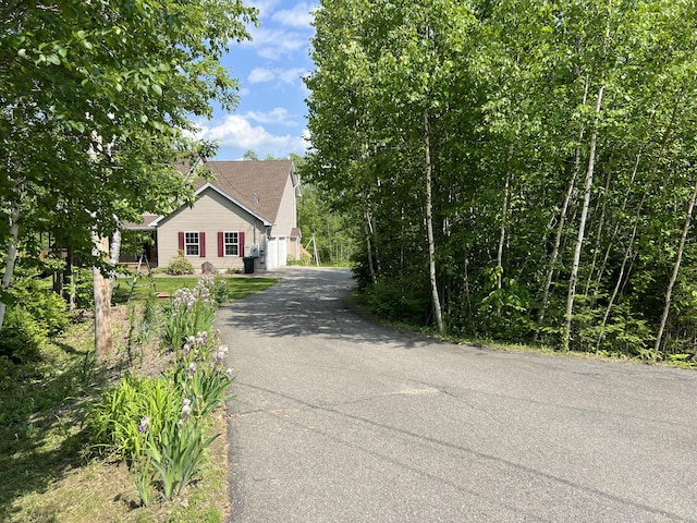 38 Dunston Dr, Glenburn, ME 04401 - view of asphalt driveway