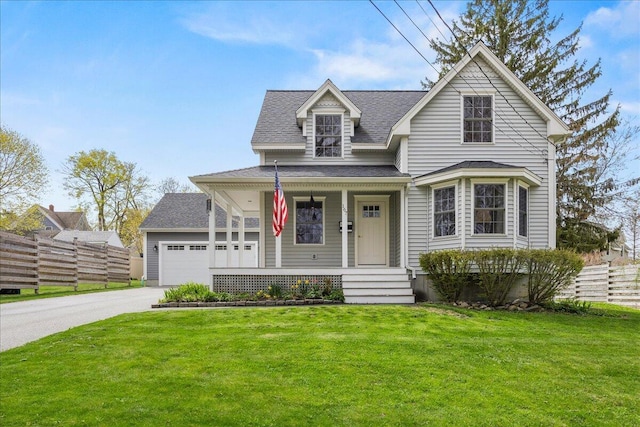 victorian-style house featuring a porch, concrete driveway, a shingled roof, and a garage