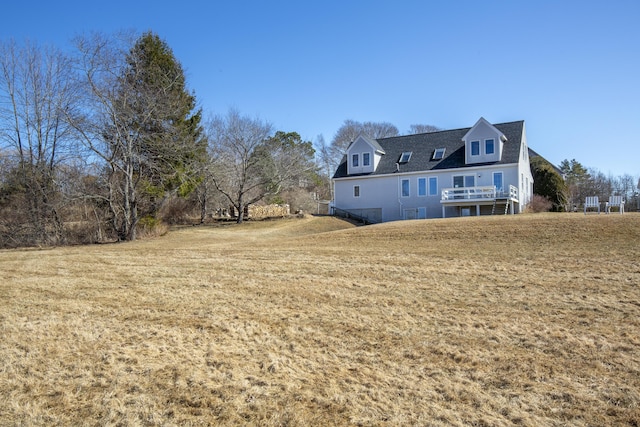 108 N Shore Dr, Owls Head, ME 04854 - back of house featuring a yard