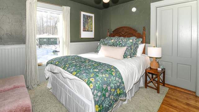 77 Smith St, Fryeburg, ME 04037 - bedroom with wood finished floors and wainscoting