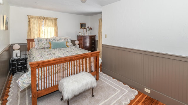 77 Smith St, Fryeburg, ME 04037 - bedroom featuring wainscoting and wood finished floors