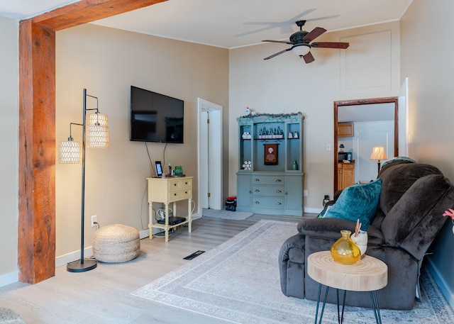 345 Songo Pond Rd, Bethel, ME 04217 - living area featuring baseboards, ceiling fan, and wood finished floors