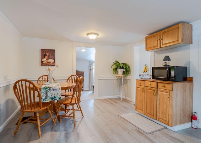 345 Songo Pond Rd, Bethel, ME 04217 - dining room with light wood-type flooring and baseboards
