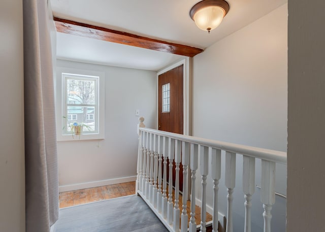 345 Songo Pond Rd, Bethel, ME 04217 - hallway featuring an upstairs landing, baseboards, and wood finished floors
