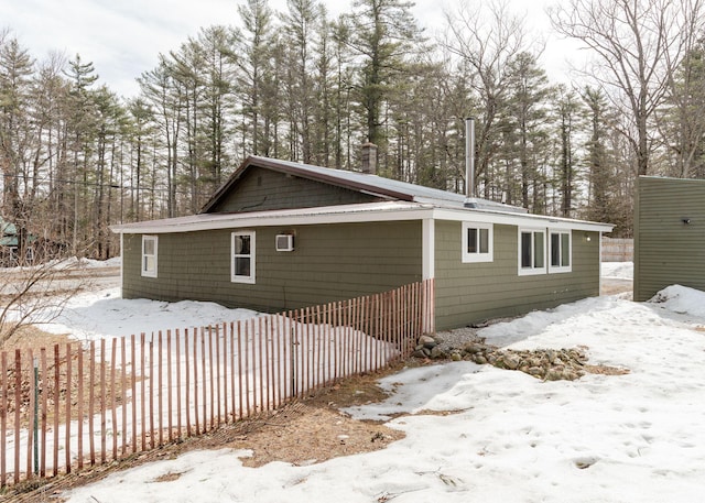 345 Songo Pond Rd, Bethel, ME 04217 - view of snow covered exterior with fence