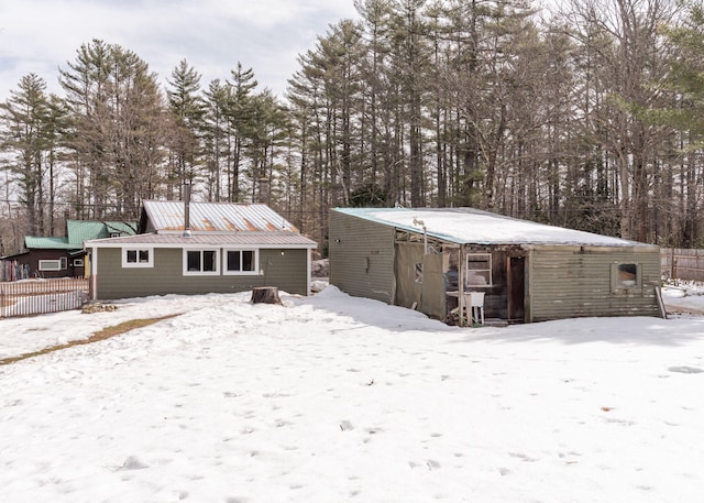 345 Songo Pond Rd, Bethel, ME 04217 - snow covered house featuring fence