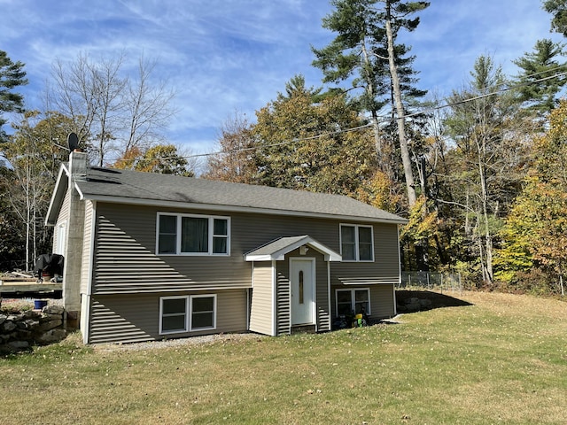 6 Alder Rd, Naples, ME 04055 - bi-level home with a chimney and a front lawn
